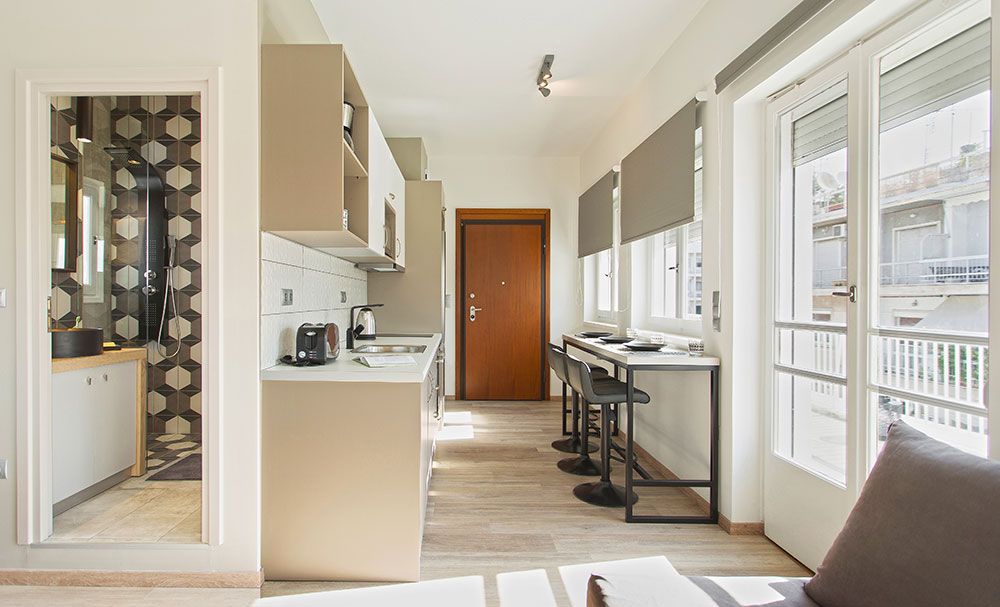 open plan kouzina se diamerima studio retire sto syntagma