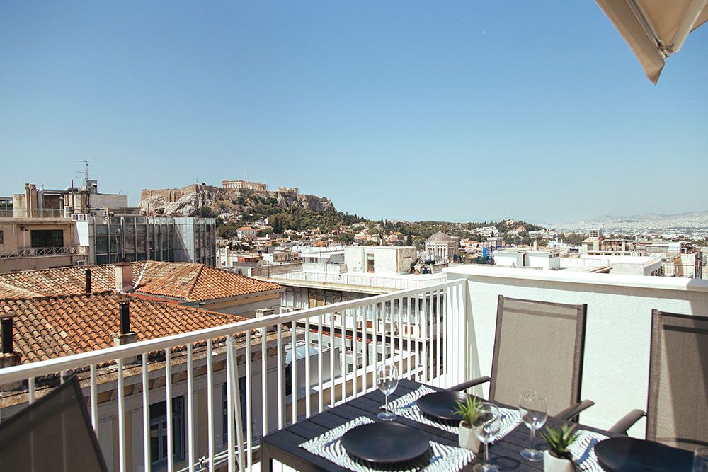veranda me thea thn acropolh